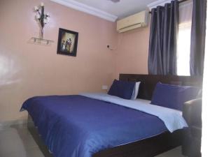 Katil atau katil-katil dalam bilik di StayCation Suites And Apartment