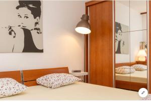 Posteľ alebo postele v izbe v ubytovaní Magnolia Suite
