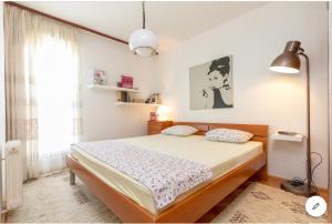 Posteľ alebo postele v izbe v ubytovaní Magnolia Suite