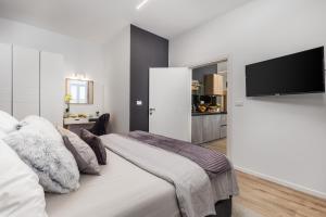 Posteľ alebo postele v izbe v ubytovaní Saint Vitus Apartments with balcony