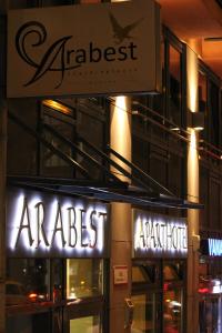 a building with a sign for anadobeadobeadobeadobeadobeadobeadobeadobeadobe at ARABEST Aparthotel & Boardinghouse in Munich