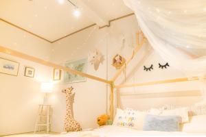 Letto o letti in una camera di 一棟貸切宿, HARMONIA東京小岩 6名max,wifi有,秋葉原16分新宿33分,ディズニー電車48分, 駐車場ありません