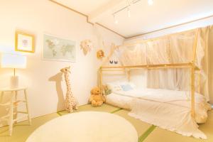 Letto o letti in una camera di 一棟貸切宿, HARMONIA東京小岩 6名max,wifi有,秋葉原16分新宿33分,ディズニー電車48分, 駐車場ありません