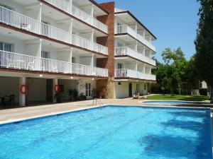 a large swimming pool in front of a building at Sunway Torre La Veleta in Sitges