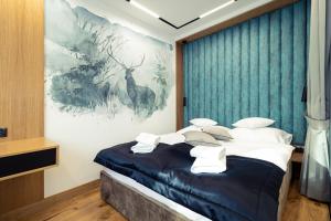 Posteľ alebo postele v izbe v ubytovaní CHARDONNAY APARTMENT ZAKOPANE Centrum Jagiellońska Residence