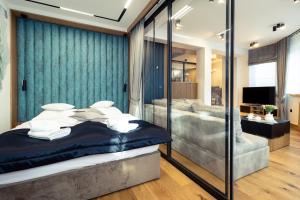 Posteľ alebo postele v izbe v ubytovaní CHARDONNAY APARTMENT ZAKOPANE Centrum Jagiellońska Residence