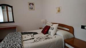 Posteľ alebo postele v izbe v ubytovaní Hostal "Los Chanos el Ruso"