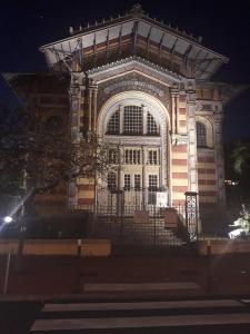 a large building with a gate in front of it at Beauty F2 Cosy Island in Fort-de-France