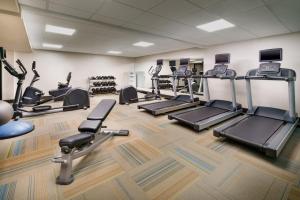 a gym with treadmills and elliptical machines at Holiday Inn Express Boston, an IHG Hotel in Boston