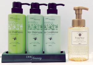 a group of four bottles of hair products on a shelf at Hotel Trend Abeno Tennoji in Osaka