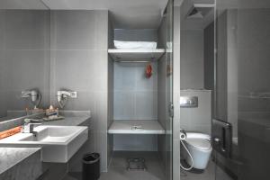 Vannituba majutusasutuses HARRIS Hotel & Conventions Malang