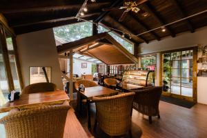 Ein Sitzbereich in der Unterkunft Zhou Ye Cottage