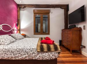 Posteľ alebo postele v izbe v ubytovaní Casa txema tu casa en Bilbao