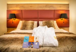 Das Gutenbrunn Thermen & Sporthotel客房内的一张或多张床位