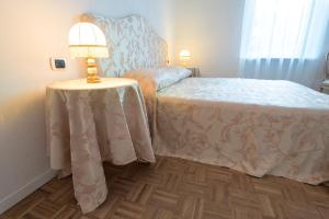 Postel nebo postele na pokoji v ubytování Atrium Verona