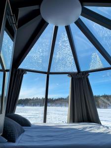 Postel nebo postele na pokoji v ubytování Wilderness Hotel Nangu & Igloos