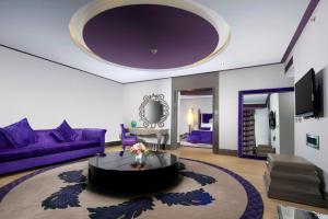 
a living room filled with furniture and decor at Selectum Luxury Resort Belek in Belek
