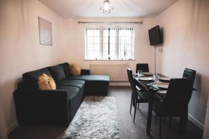 Posezení v ubytování Asha Court Serviced Apartments