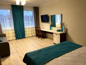Postel nebo postele na pokoji v ubytování Hotel&SPA Pysanka, Готель Писанка, 3 сауни та джакузі - індивідуальний відпочинок у СПА