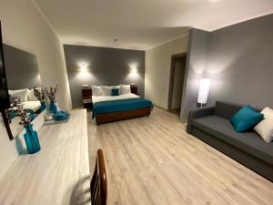 Postel nebo postele na pokoji v ubytování Hotel&SPA Pysanka, Готель Писанка, 3 сауни та джакузі - індивідуальний відпочинок у СПА