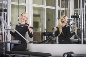 Posilňovňa alebo fitness centrum v ubytovaní Hotel Vila Livia