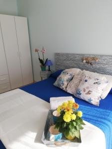 Postel nebo postele na pokoji v ubytování Le Torrette di Anna - Tropea