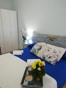 Postel nebo postele na pokoji v ubytování Le Torrette di Anna - Tropea