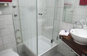 Koupelna v ubytování Hotel Excelsior