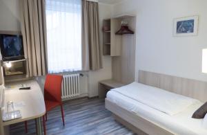 Postel nebo postele na pokoji v ubytování Hotel Excelsior