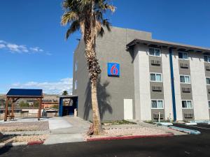 a building with a sign on the side of it at Motel 6 Bullhead City, Az - Laughlin in Bullhead City