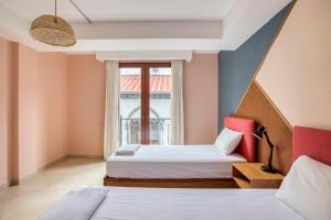 Postel nebo postele na pokoji v ubytování Hotel Brio Centro