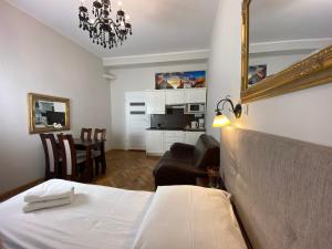 Posteľ alebo postele v izbe v ubytovaní P&J Apartamenty Św. Krzyża
