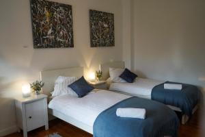 מיטה או מיטות בחדר ב-Wohnung in Lüneburg