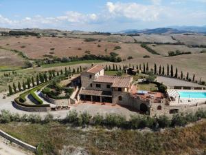 an aerial view of a estate with a pool at Agriturismo Casa al Povero in Volterra