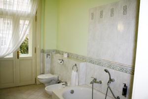Kúpeľňa v ubytovaní Hotel Mignon