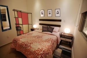 Postel nebo postele na pokoji v ubytování Casa Rosa Smart House