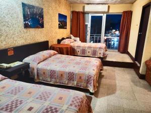 Katil atau katil-katil dalam bilik di Hotel Riviera
