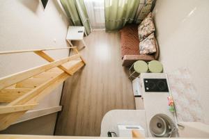 an overhead view of a tiny house with a staircase at Dekabrist Apartment Bogomyagkogo 66 in Chita