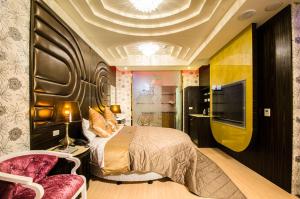 TV a/nebo společenská místnost v ubytování Zheng Yi Classic Hotel & Motel