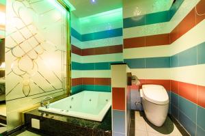 Koupelna v ubytování Zheng Yi Classic Hotel & Motel