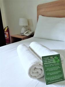 Postel nebo postele na pokoji v ubytování Rublin Hotel Cebu