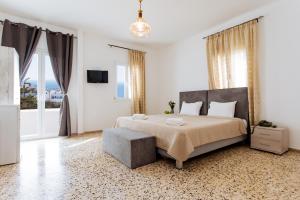 Postel nebo postele na pokoji v ubytování Nikos Hotel