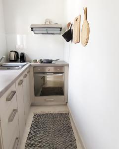 Kuchyň nebo kuchyňský kout v ubytování Casita