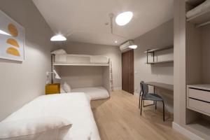Posteľ alebo postele v izbe v ubytovaní Real Segovia Apartments by Recordis Hotels
