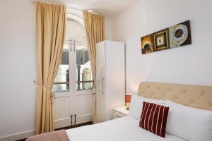 Katil atau katil-katil dalam bilik di Strathmore House Apartments