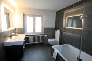 Koupelna v ubytování Adora + 29 fotografií