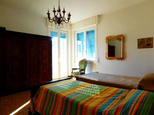 Ένα ή περισσότερα κρεβάτια σε δωμάτιο στο Quadrilocale con Vista