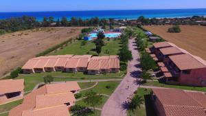an aerial view of a resort with a swimming pool at Rey beach Club in Monte Nai