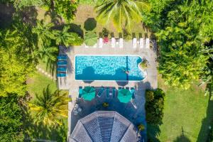 Bazén v ubytování Plantation Beach Villas nebo v jeho okolí
