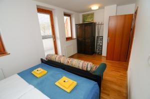 Postel nebo postele na pokoji v ubytování Pierta Apartment